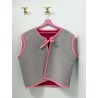 Chalecos reversibles ribete Rosa